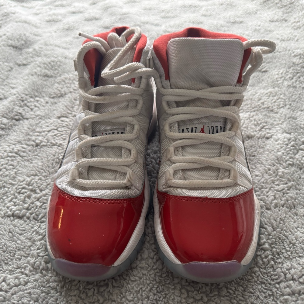 Red cherry Jordan 11s